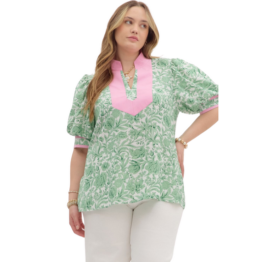 Elevate your wardrobe with our Plus Size Floral Print Puff Sleeve Top. Designed by industry experts, this lightweight woven top features a vibrant floral print, voluminous puff sleeves, and a caftan-inspired high neck band for a unique and stylish look. The split V-neck and cuff finish add a touch of contrast, making it perfect for adding a pop of color to any outfit.&nbsp;