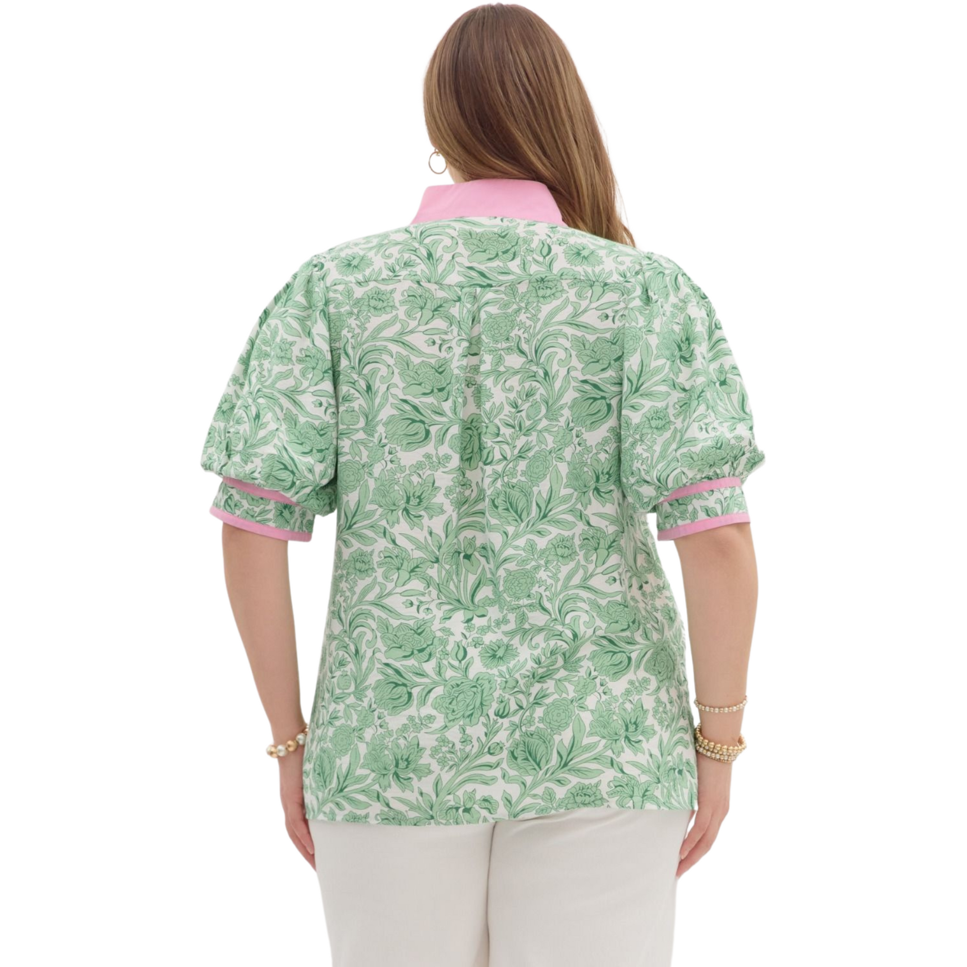 Elevate your wardrobe with our Plus Size Floral Print Puff Sleeve Top. Designed by industry experts, this lightweight woven top features a vibrant floral print, voluminous puff sleeves, and a caftan-inspired high neck band for a unique and stylish look. The split V-neck and cuff finish add a touch of contrast, making it perfect for adding a pop of color to any outfit.&nbsp;