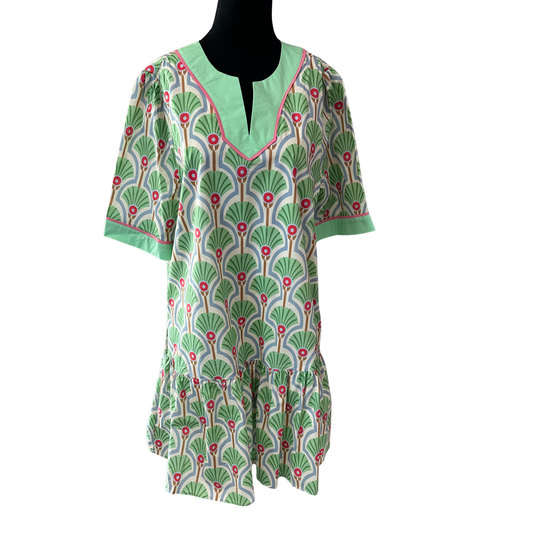Elevate your wardrobe with this vibrant green woven print mini dress from She+Sky. Designed for the modern woman, this piece features eye-catching contrast detailing that adds dimension and style. The thoughtfully placed pockets offer both function and fashion—no more searching for somewhere to keep your essentials. Cut generously for plus-size comfort, this dress flatters your figure while allowing easy movement. 