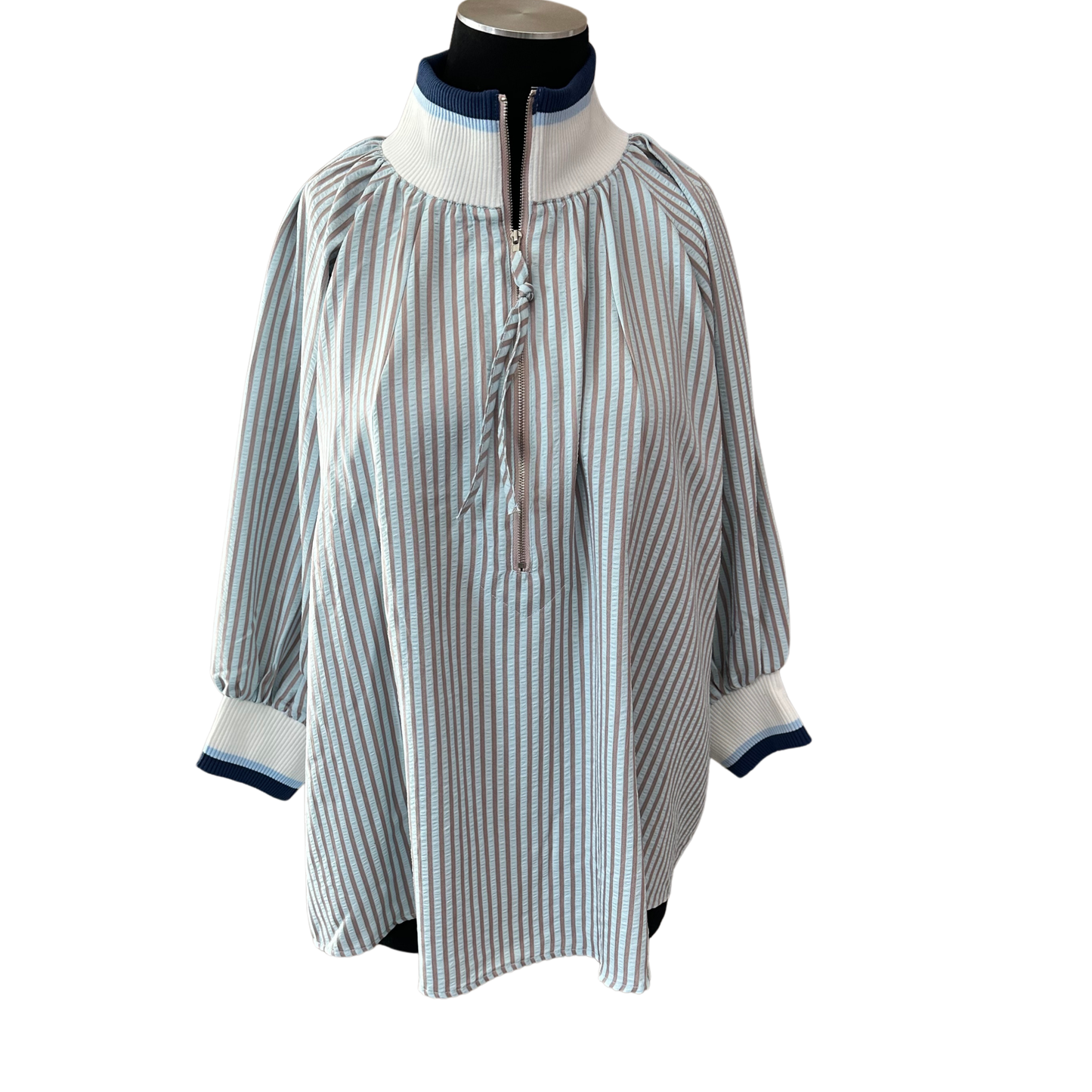 Elevate your casual wardrobe with this comfortable She+Sky striped top, designed for a flattering fit. The half-zip neckline and long sleeves offer versatile layering options, while the classic striped pattern adds timeless style. Perfect for plus-size figures, this piece transitions seamlessly from day to night. Pair it with your favorite jeans or leggings for an effortless, put-together look.