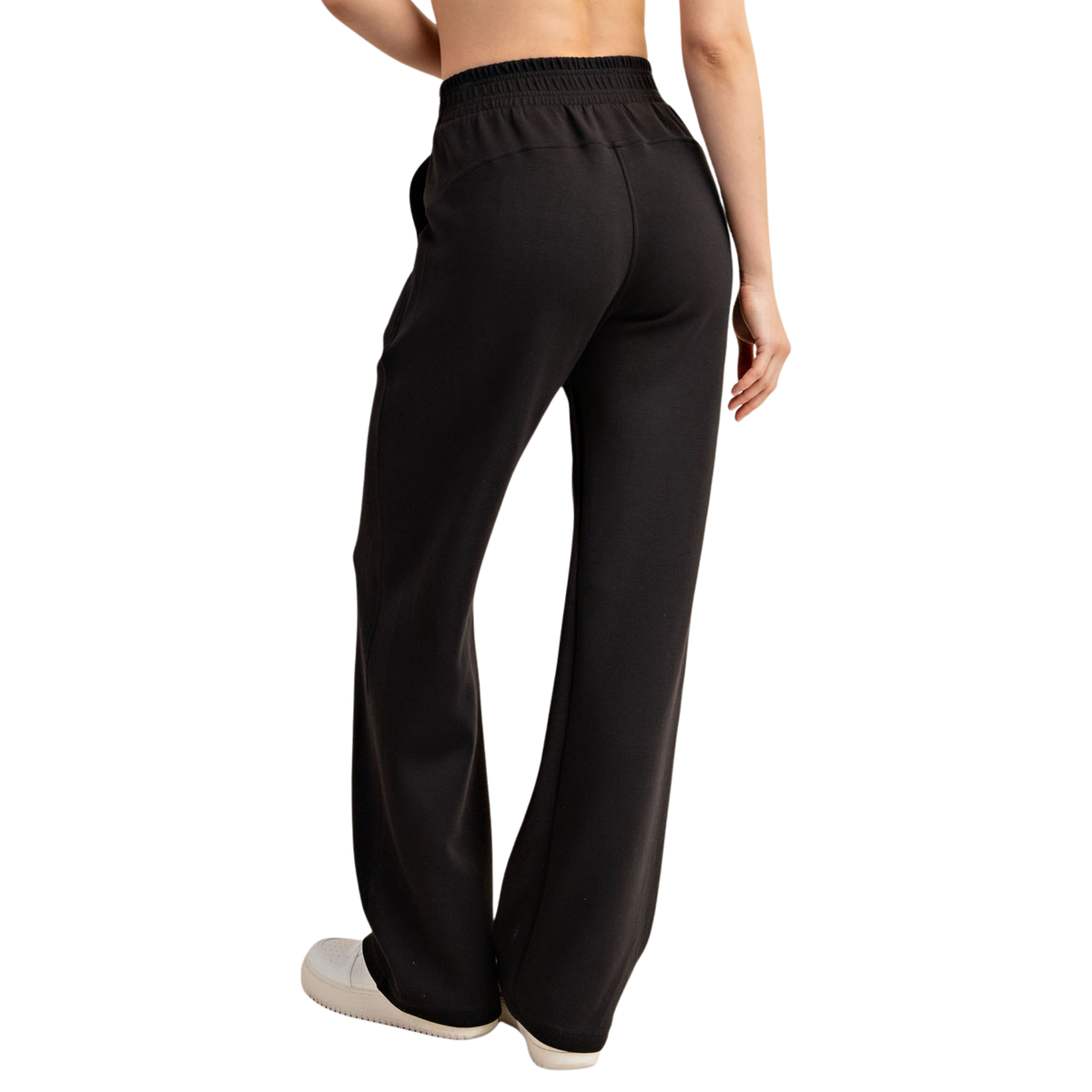 Elevate your comfort game with these Modal Scuba Straight Pants from Rae Mode. Crafted in soft, breathable modal fabric, these black straight-leg pants offer a sleek silhouette that works for lounging or casual outings. The scuba-inspired construction provides gentle support and a flattering fit. Available in plus sizes to celebrate every body. Perfect for those who refuse to compromise on style or comfort.