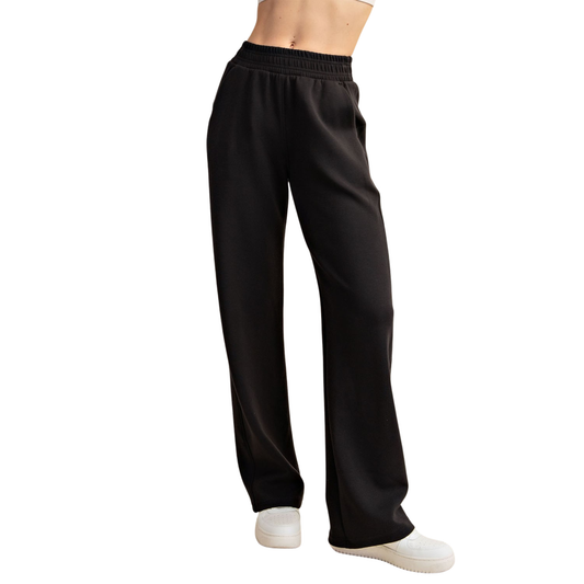 Elevate your comfort game with these Modal Scuba Straight Pants from Rae Mode. Crafted in soft, breathable modal fabric, these black straight-leg pants offer a sleek silhouette that works for lounging or casual outings. The scuba-inspired construction provides gentle support and a flattering fit. Available in plus sizes to celebrate every body. Perfect for those who refuse to compromise on style or comfort.