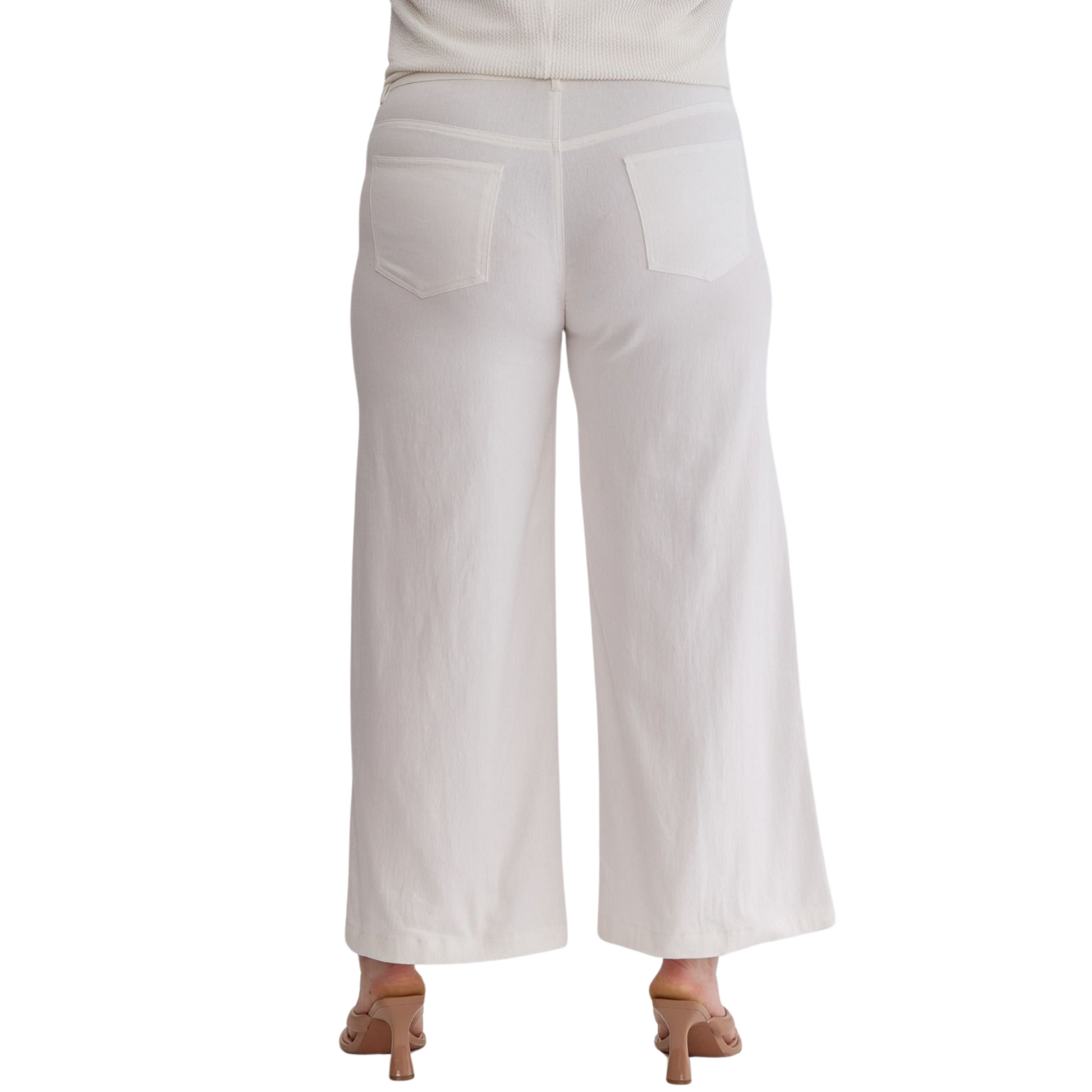 Expertly crafted and stylish, the High Waist Wide Leg Pants are a versatile addition to your wardrobe. With a flattering acid wash and high waist design, these pants feature a zipper front closure for a secure fit and convenient pockets at the side and back. Made with lightweight, non-sheer fabric, these pants are perfect for any occasion. Available in plus size and classic white.