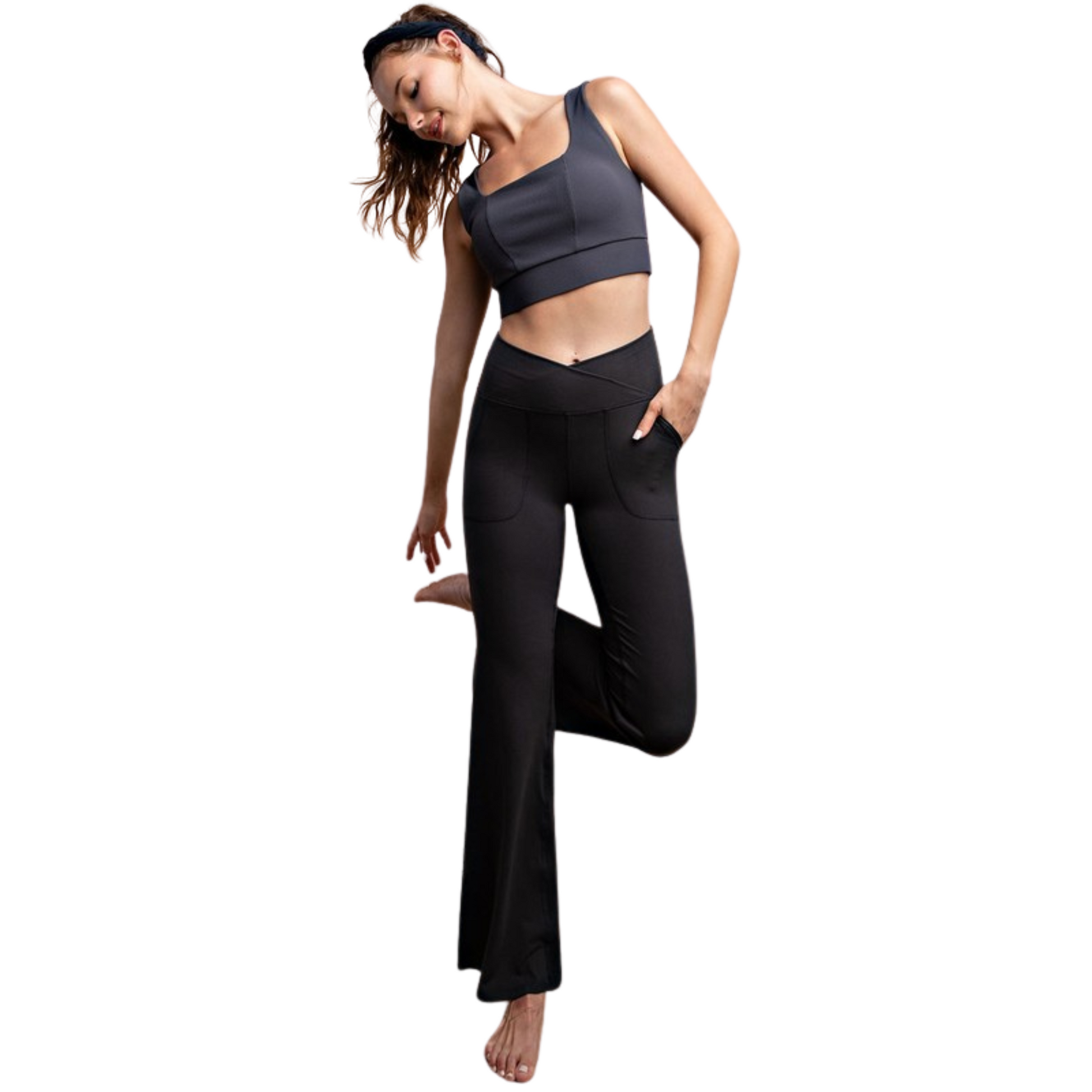 These black, full length butter yoga pants are designed for plus-size women and provide a buttery soft feel. The V waist and flared bell bottoms offer extra comfort and style, while the pockets provide convenience. Perfect for any yoga class or casual wear.