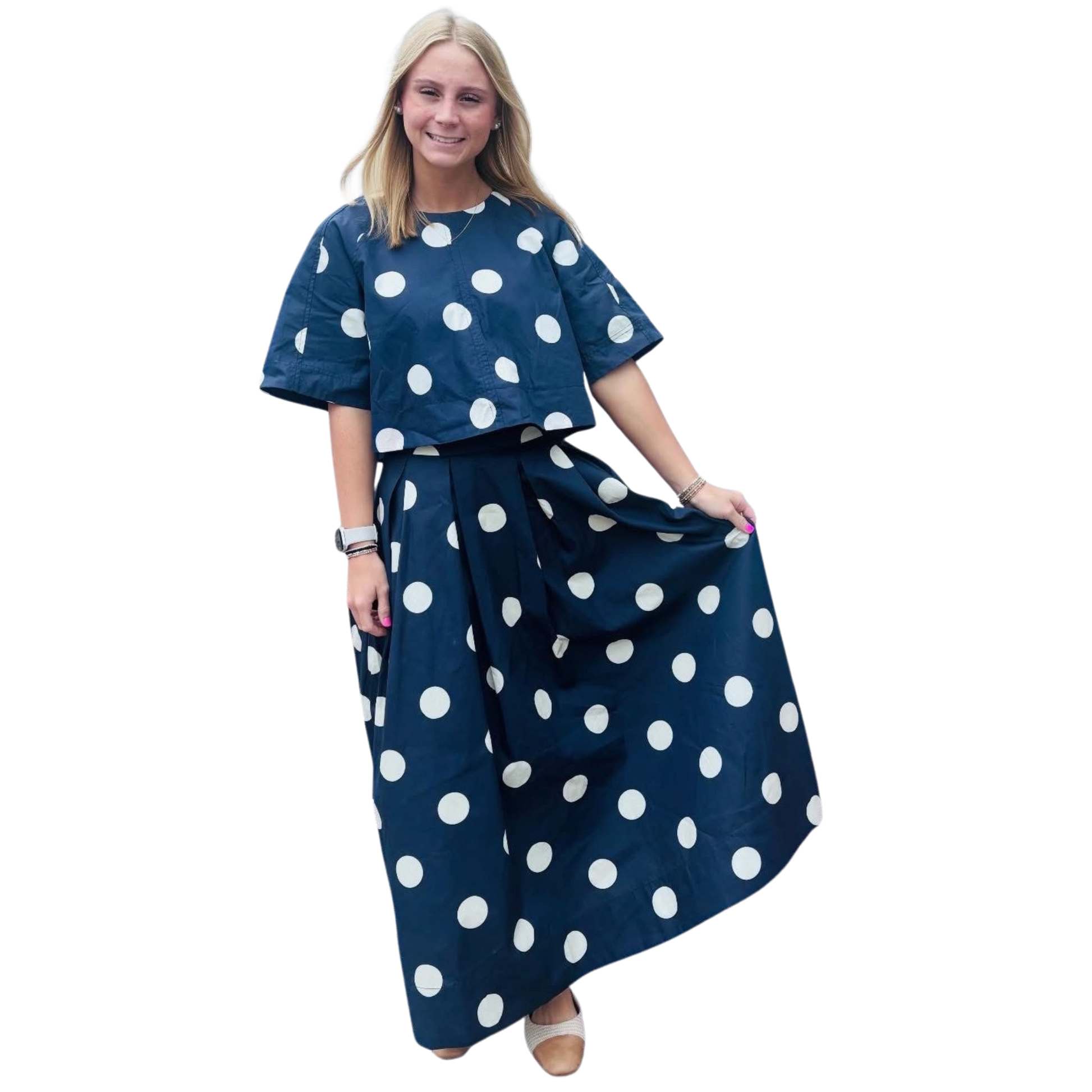 Elevate your wardrobe with this charming Heyson polka dot set. The navy background features classic white polka dots for timeless appeal. The back tie top offers a flattering, adjustable fit with feminine detail, while the pleated midi skirt provides elegant movement and a sophisticated silhouette. Perfect for brunch, casual outings, or dressed-up occasions. This coordinated two-piece set takes the guesswork out of styling—wear them together for a cohesive look or mix and match with your existing pieces.
