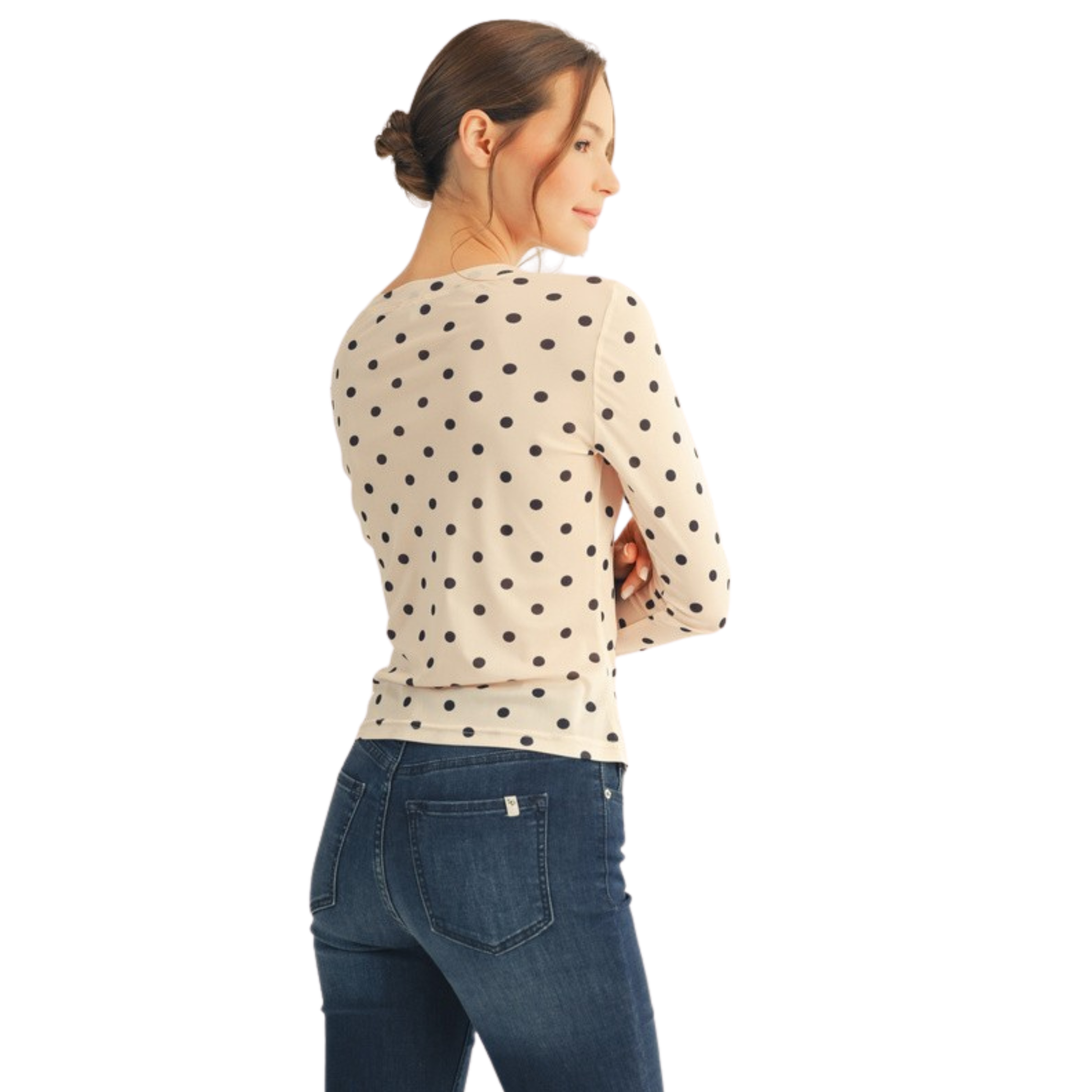 Elevate your wardrobe with this Jodifl fitted top, featuring a charming peach base adorned with delicate polka dots. The long sleeves provide versatile coverage while the tailored fit flatters your silhouette, making it an ideal choice for layering or wearing solo. Perfect for transitional seasons, this piece seamlessly moves from casual daytime looks to polished evening ensembles. The classic polka dot pattern adds timeless appeal to any outfit.