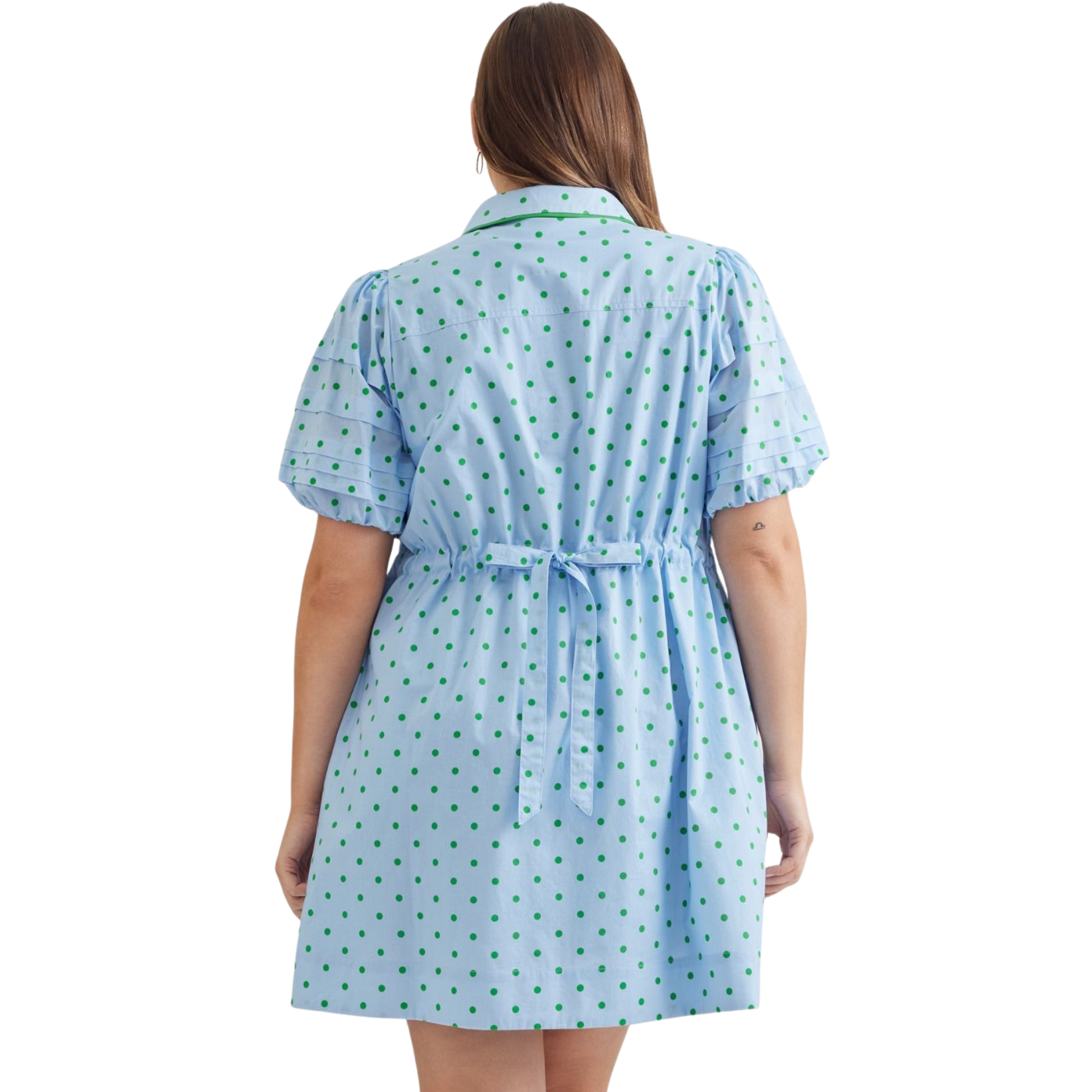 Elevate your wardrobe with this charming Entro mini dress, featuring a playful blue and green polka dot pattern that brings instant personality to any outfit. The flattering V-neckline and puff sleeves create a feminine silhouette, while the classic collar adds a polished touch. Designed in plus sizes for a comfortable, confident fit, this versatile piece transitions seamlessly from casual days to evening occasions. Perfect for those who love bold prints and timeless style.