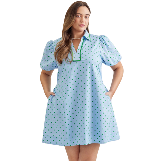 Elevate your wardrobe with this charming Entro mini dress, featuring a playful blue and green polka dot pattern that brings instant personality to any outfit. The flattering V-neckline and puff sleeves create a feminine silhouette, while the classic collar adds a polished touch. Designed in plus sizes for a comfortable, confident fit, this versatile piece transitions seamlessly from casual days to evening occasions. Perfect for those who love bold prints and timeless style.