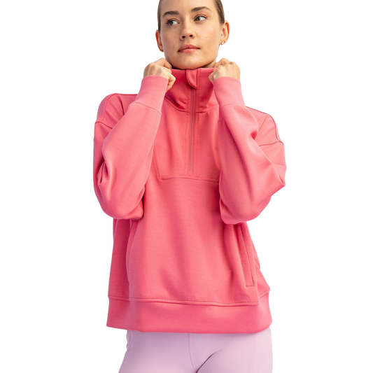 Elevate your activewear collection with this Modal Quarter Zip Pullover from Rae Mode. Crafted from a soft poly-span blend that moves with you, this pullover features a flattering mock neck and comes in a vibrant bright pink. Available in both regular and plus sizes, it's designed to fit and flatter every body. Perfect for layering during workouts or casual days when comfort is key.