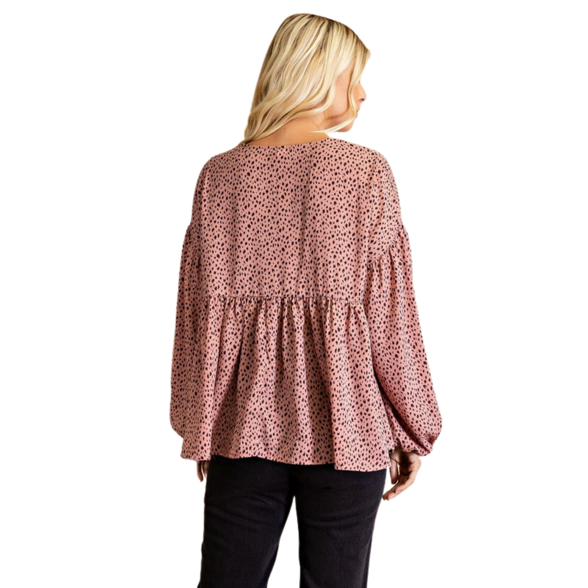 This stylish V-Neck Printed Blouse offers a sophisticated look perfect for any occasion. Crafted from a lightweight fabric, the mauve color and long sleeves provide comfort and elegance. Make a statement with this fashionable piece that accentuates the v neck and creates a classic, timeless look.