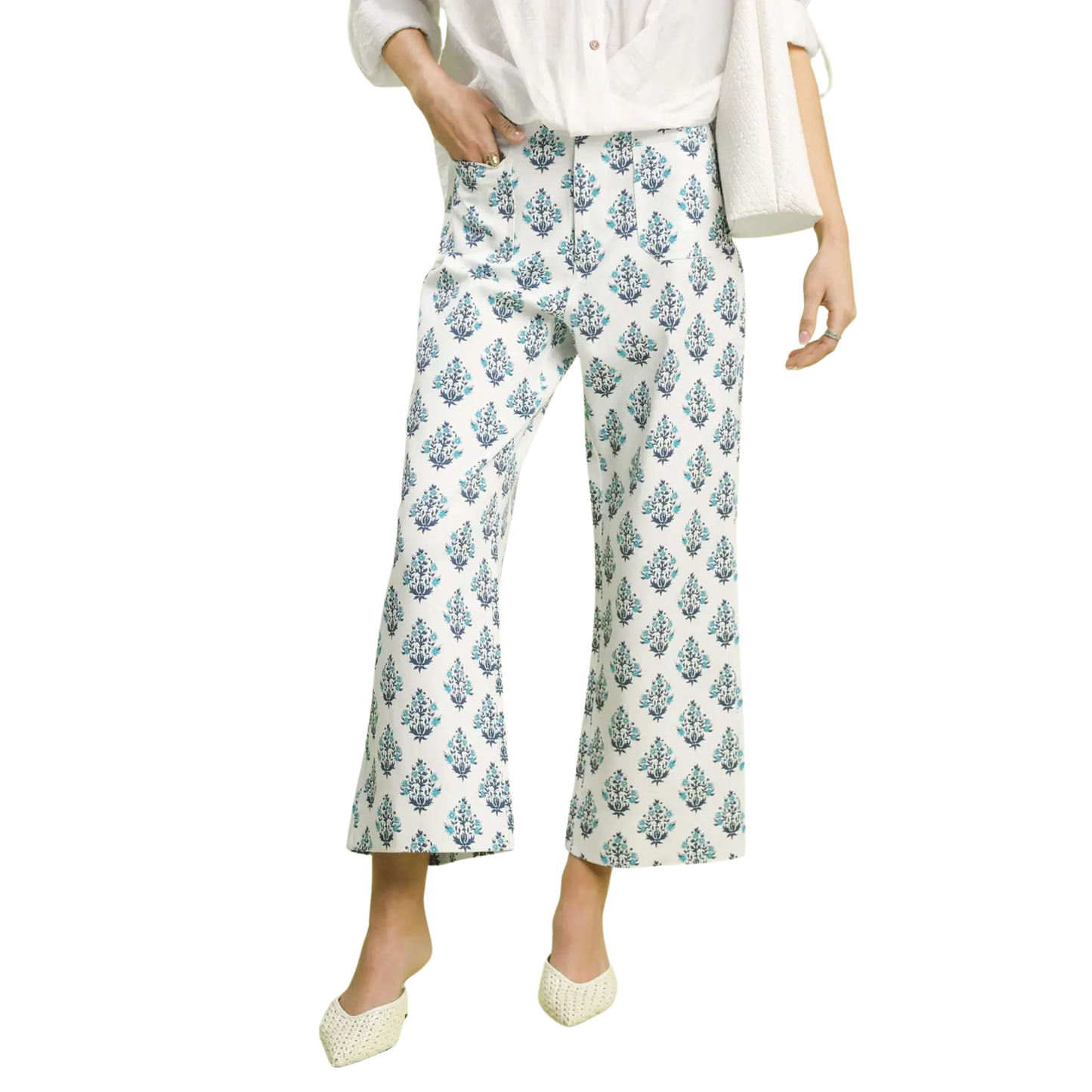 Elevate your casual wardrobe with these printed cropped pants from Umgee, featuring a striking blue design. The cropped silhouette offers a modern, flattering fit perfect for pairing with sneakers or sandals. The white base provides versatility, while the eye-catching printed pattern adds personality to any outfit. Ideal for warm weather styling or layering during cooler seasons.