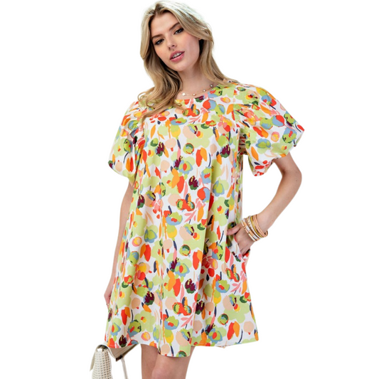 Upgrade your wardrobe with our Bubble Sleeve Mini Dress! Made from printed cotton poplin, this A-line dress features short bubble sleeves with smocked shoulders for added comfort. Equipped with side pockets, the multicolor abstract print design adds a touch of playfulness to this coral-colored dress. With a back button closure, this above knee dress length offers a relaxed and loose fit, perfect for any plus size individual.