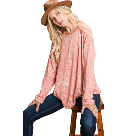 Stay comfortable and stylish with this Printed Round Neck Long Sleeve Top. This plus size top is designed with a loose fit, a long sleeve construction, and a stunning pink color. Ideal for any casual occasion, this top offers a comfortable fit and a great look.