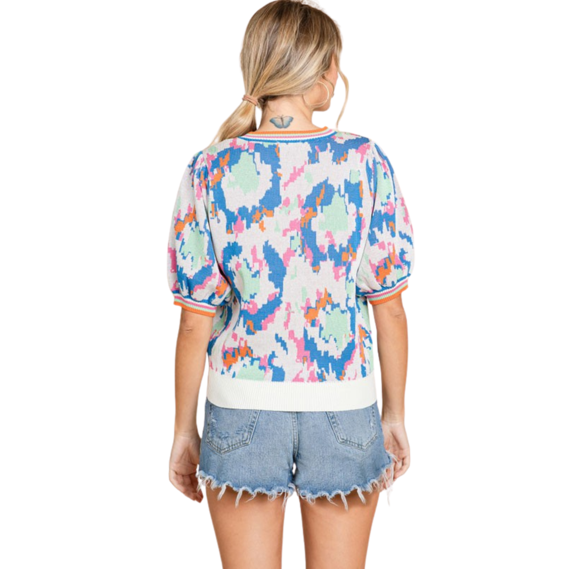 The Print Shot Bubble Sleeve Top from Jodifl combines contemporary design with everyday wearability. This short-sleeve sweater features an eye-catching abstract print that adds visual interest to your wardrobe staples. The signature bubble sleeves provide a modern silhouette while maintaining comfort for all-day wear. Perfect for layering or wearing solo, this versatile piece transitions seamlessly from casual outings to relaxed office settings. 