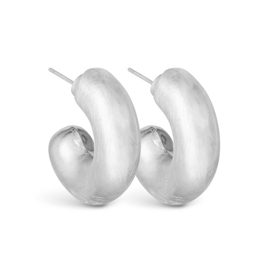 Upgrade your style with the CeCe Puffy Hoops. Made of high-quality silver with a sleek matte finish, these small hoop earrings are perfect for any occasion. Elevate your look with a touch of elegance and sophistication.