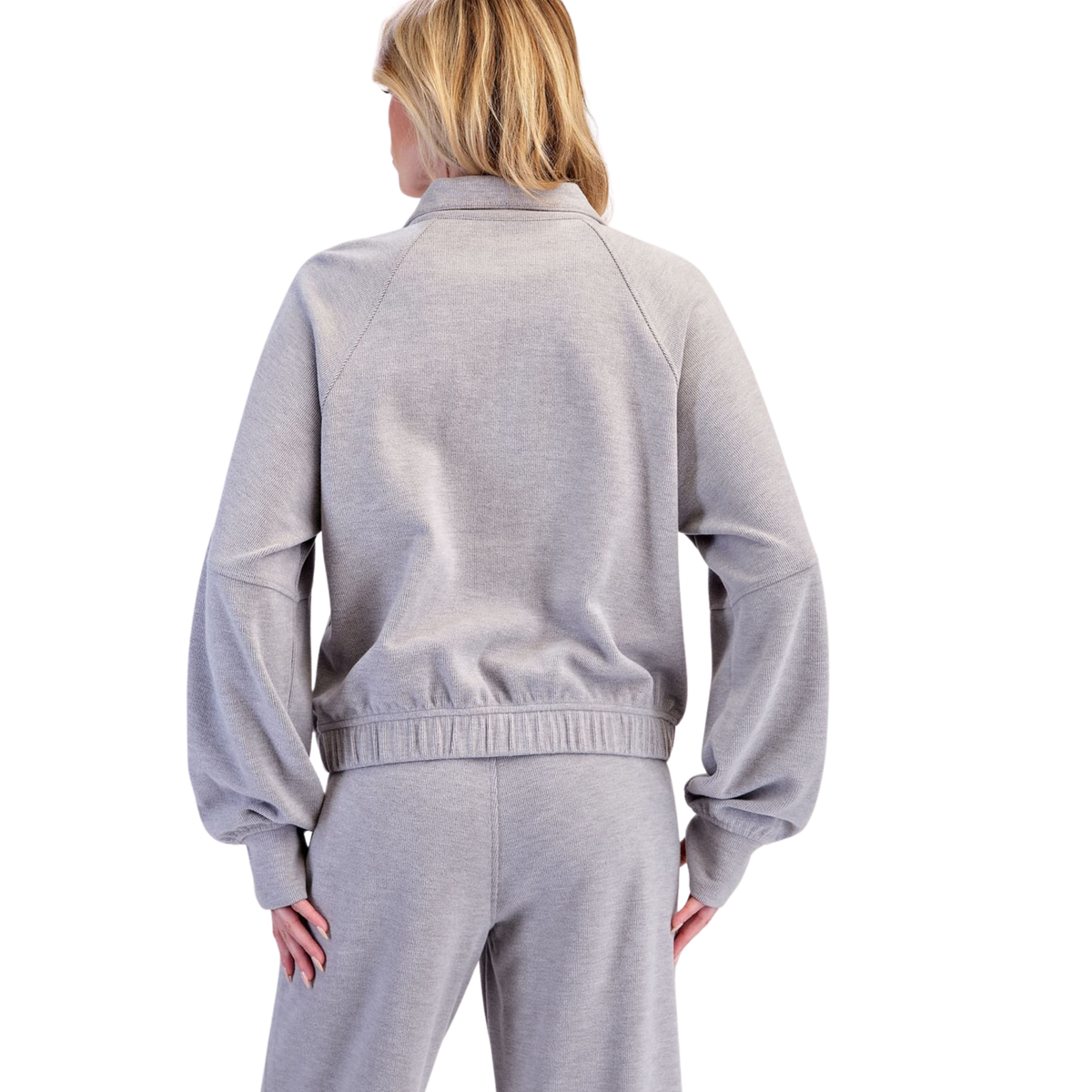 The Rib Brushed Quarter Zip Pullover from Rae Mode combines effortless style with everyday comfort. Crafted in a sophisticated heather grey, this collared pullover features a convenient quarter zip design for easy layering and temperature control. The textured rib fabric adds subtle dimension while maintaining a polished, versatile look that pairs seamlessly with jeans, joggers, or casual trousers. Perfect for transitions between seasons or relaxed outings.
