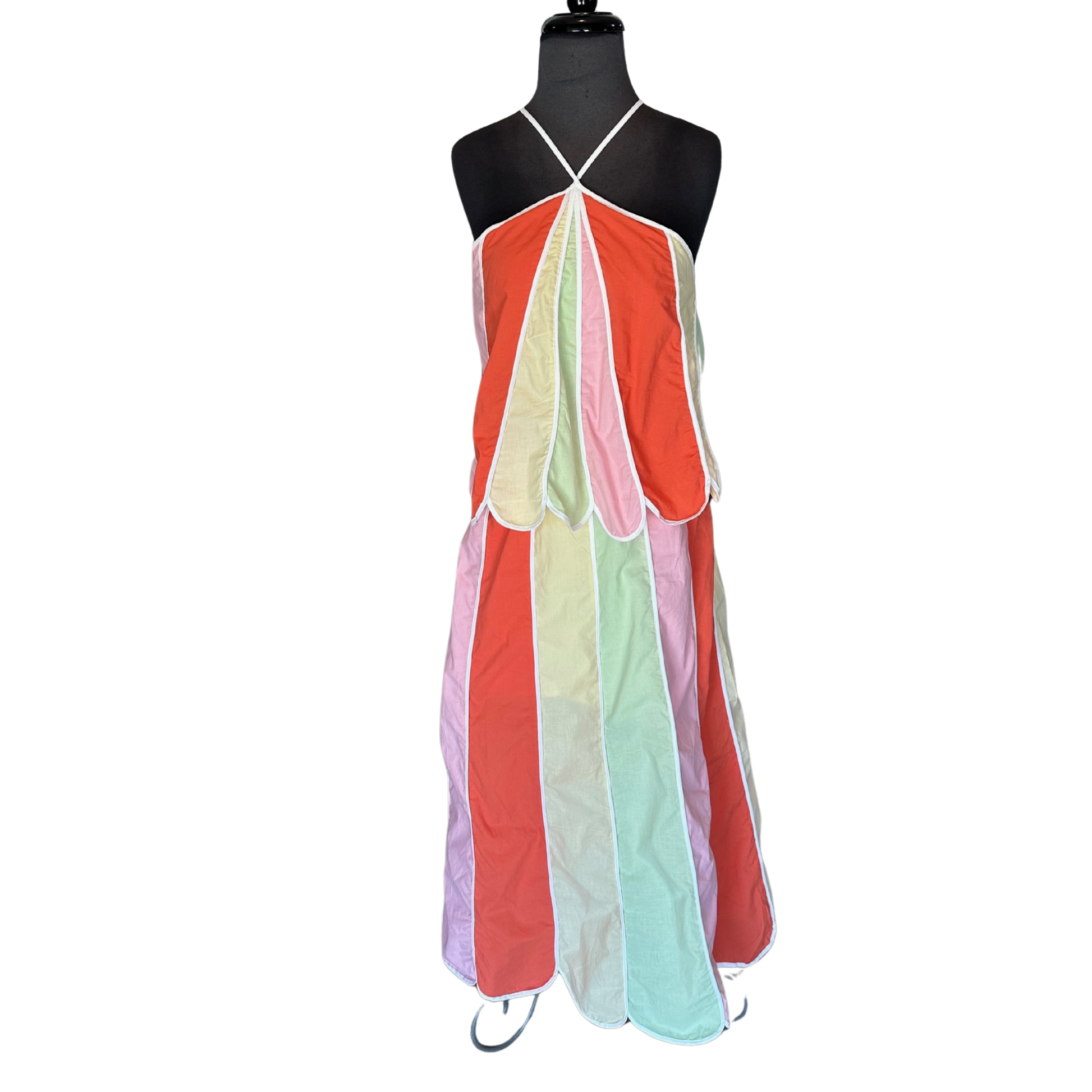 The Rainbow Umbrella Midi Dress by Heyson features a striking multi-color design that brings vibrant energy to your wardrobe. The flattering halter neck creates an elegant silhouette while offering comfortable support. Cut to midi length, this dress transitions seamlessly from day to evening wear. Perfect for making a bold statement at any occasion, the Heyson quality ensures lasting wear and comfort. Pair with your favorite accessories to complete the look.