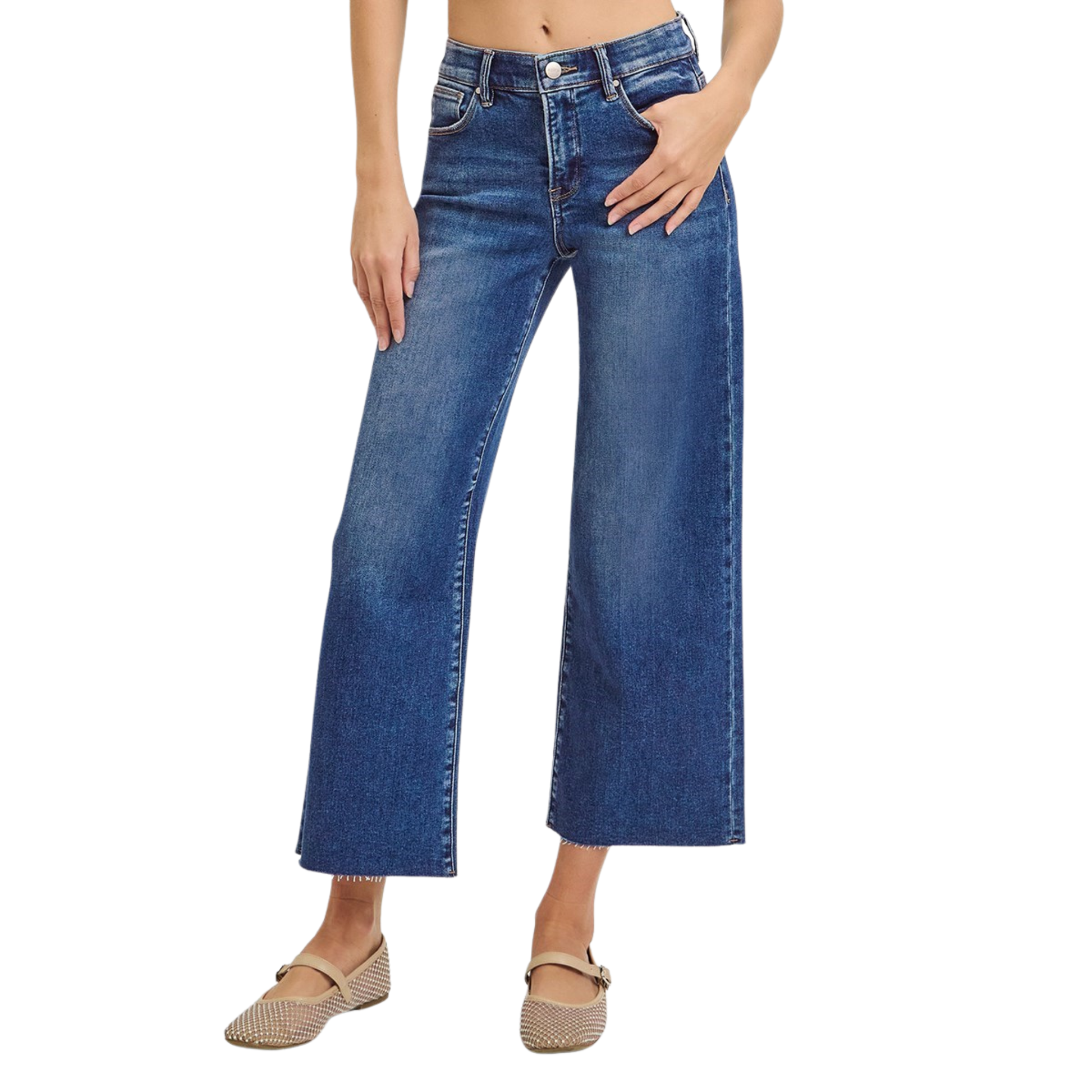 Elevate your casual wardrobe with these Mid Rise Cropped Jeans from Risen. Featuring a flattering mid-rise cut and cropped length, these jeans offer a modern silhouette that pairs effortlessly with sneakers or heels. The raw hem adds an edgy, on-trend finish, while the elastic waistband ensures all-day comfort and flexibility. Crafted in a rich dark wash, they're versatile enough for everyday wear or dressed-up occasions. A wardrobe essential that combines style and comfort.