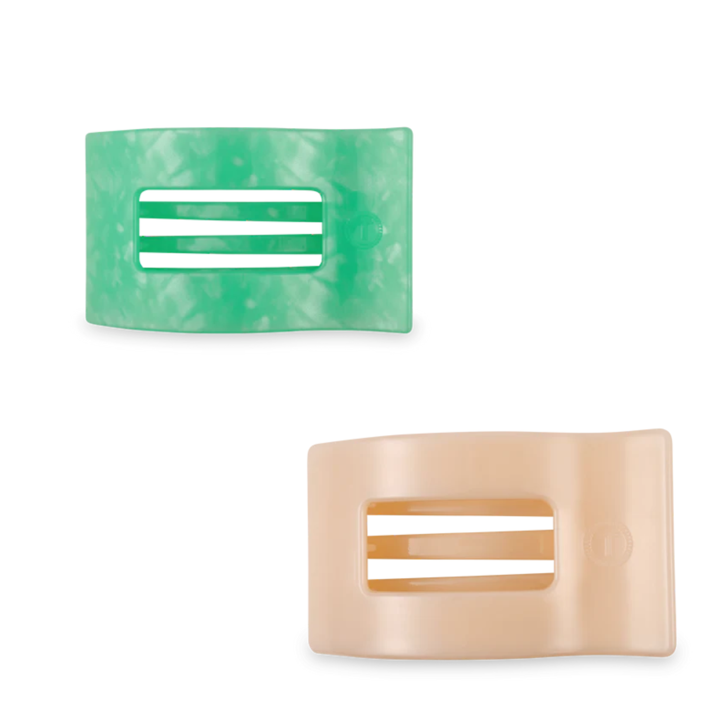 Sleek and minimalist, this small flat rectangle hair claw from Teleties keeps your hair secure with effortless style. The streamlined design grips without snagging, perfect for everyday wear or polished updos. Available in sophisticated Almond Beige and vibrant Spring Splash to match your mood and wardrobe.