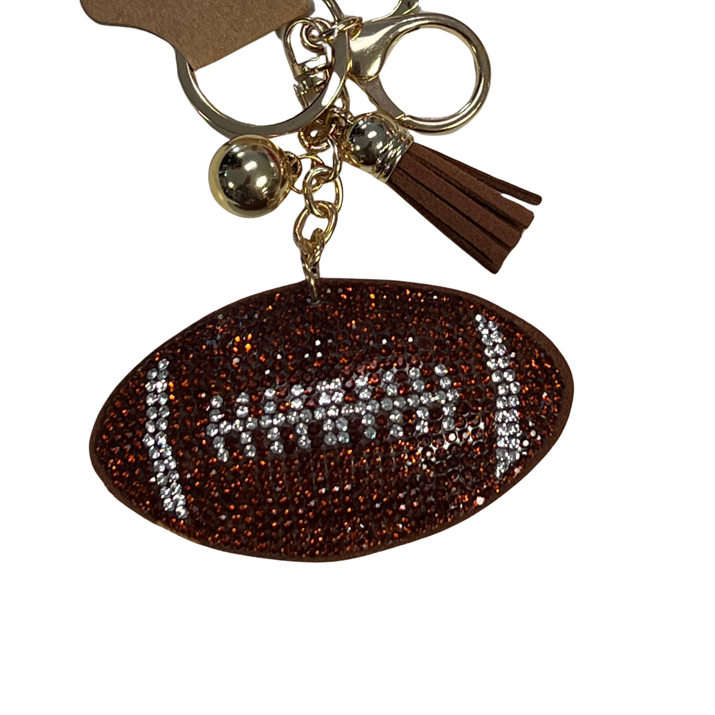 This Rhinestone Game Day Keychain is a fashionable and eye-catching way to show your team spirit. Choose from a blue paw, an orange paw, or a football, each embellished with sparkling rhinestones. Carry your keys with style on game day and show your support for your favorite team.