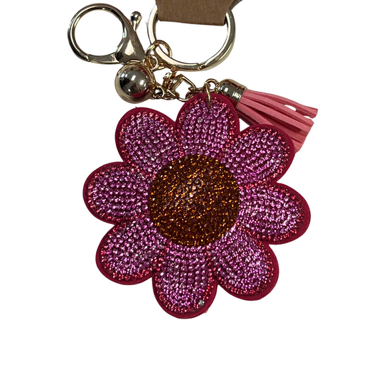 This Rhinestone Keychain features rhinestones in a variety of styles and colors, allowing you to choose the perfect accessory for your look. These rhinestones are perfect for adding a touch of sparkle to your life.