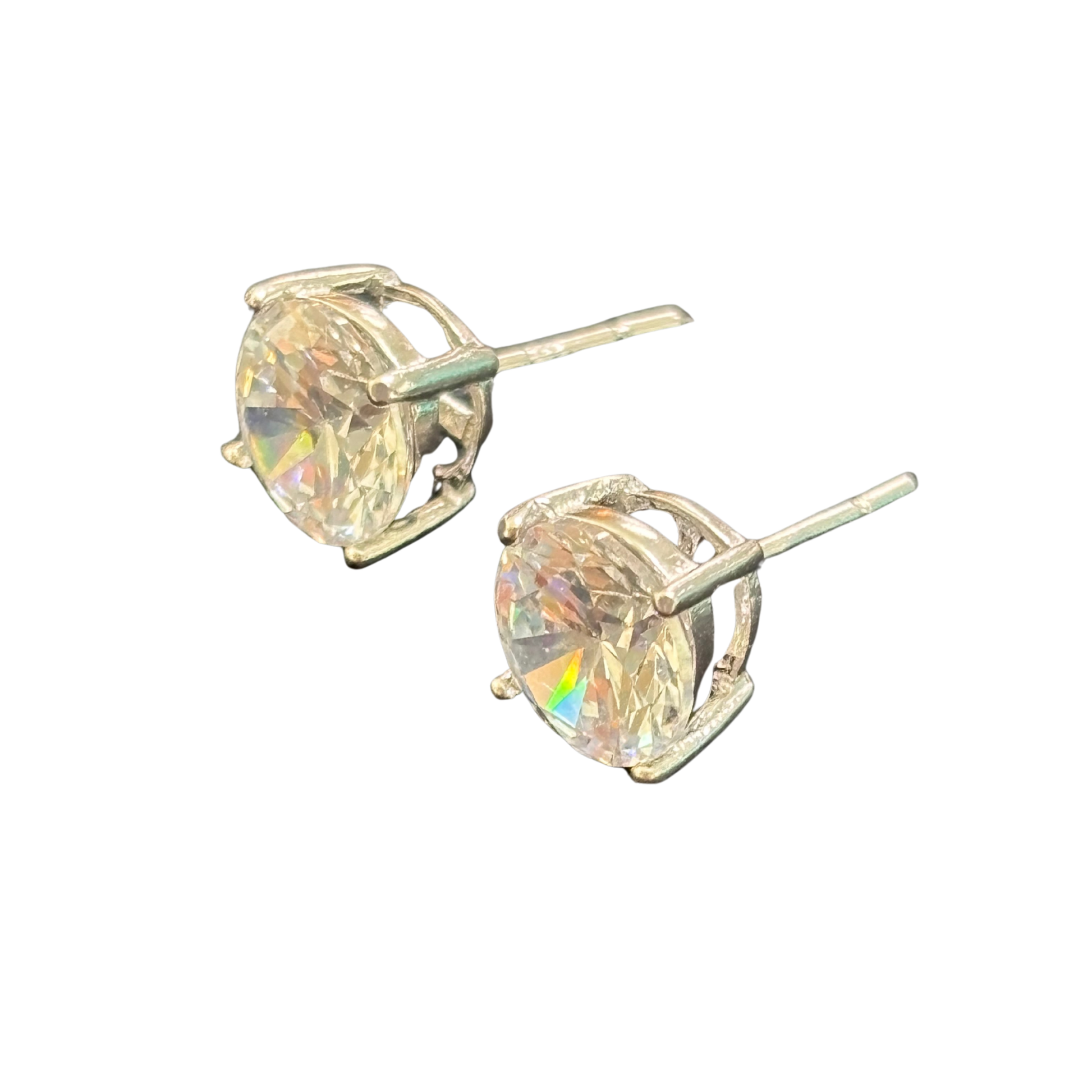 Elevate your everyday look with these delicate Small Rhinestone Studs from Skosh. Perfect for adding a subtle sparkle to any occasion, these dainty studs feature shimmering rhinestones set in a timeless design. Lightweight and comfortable for all-day wear, they're an essential addition to any jewelry collection. Whether you're dressing up or keeping it casual, these versatile studs complement any style effortlessly.