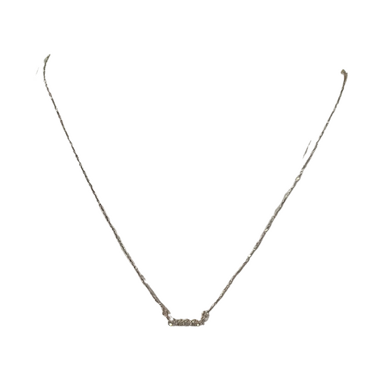 This Rhinestone Bar Necklace is the perfect stylish accessory for any occasion. It features a short necklace with a gold color and a small rhinestone bar. It is sure to add a touch of sparkle and shine to your look.