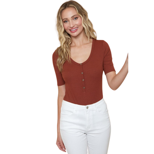 Our lightweight Ribbed Bodysuit features a modern v neck and is designed with button down detailing. Crafted from a breathable fabric blend, this stylish bodysuit offers cool, comfortable wear all day long.