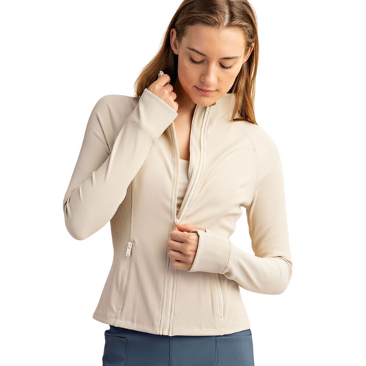 This Rae Mode 2x2 Ribbed Nylon Jacket in beige offers a sleek, form-fitting silhouette crafted from a textured ribbed fabric. Featuring a convenient zip-up front, it combines style with practicality for everyday wear. Its tailored fit enhances your shape while providing comfortable flexibility, making it a versatile addition to any wardrobe.