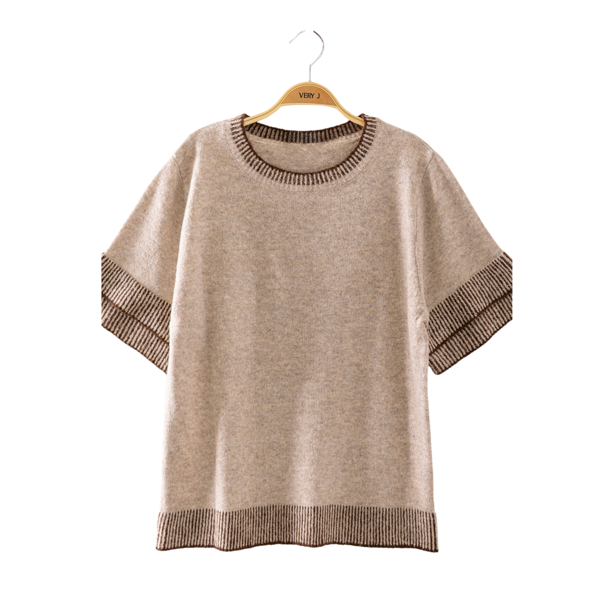 The Contrast Ribbed Knit Top from Very J combines comfort with contemporary style. Crafted from soft rib knit fabric, this short-sleeve top features a mocha/chocolate color palette that pairs effortlessly with any wardrobe. The structured ribbed texture adds visual interest and a refined silhouette, making it ideal for casual outings or layered styling. Perfect for those seeking quality basics that deliver both comfort and versatility.