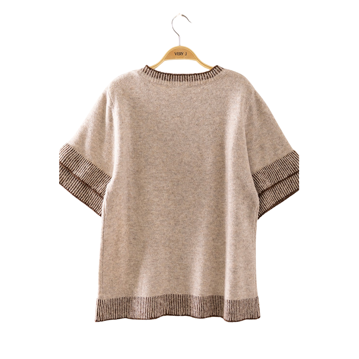 The Contrast Ribbed Knit Top from Very J combines comfort with contemporary style. Crafted from soft rib knit fabric, this short-sleeve top features a mocha/chocolate color palette that pairs effortlessly with any wardrobe. The structured ribbed texture adds visual interest and a refined silhouette, making it ideal for casual outings or layered styling. Perfect for those seeking quality basics that deliver both comfort and versatility.