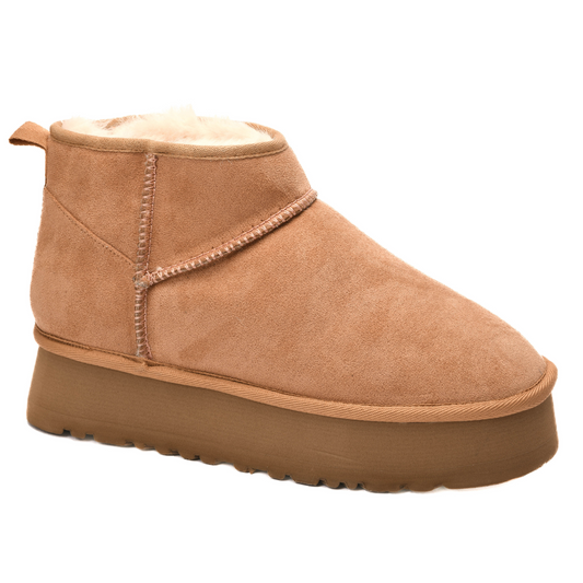 Introducing Room Service - the stylish and versatile faux suede bootie from Corkys. Enjoy the luxurious feel of faux suede in a chic camel color. Perfect for any occasion, this bootie is a must-have in your wardrobe. Elevate your style with Corkys brand quality.