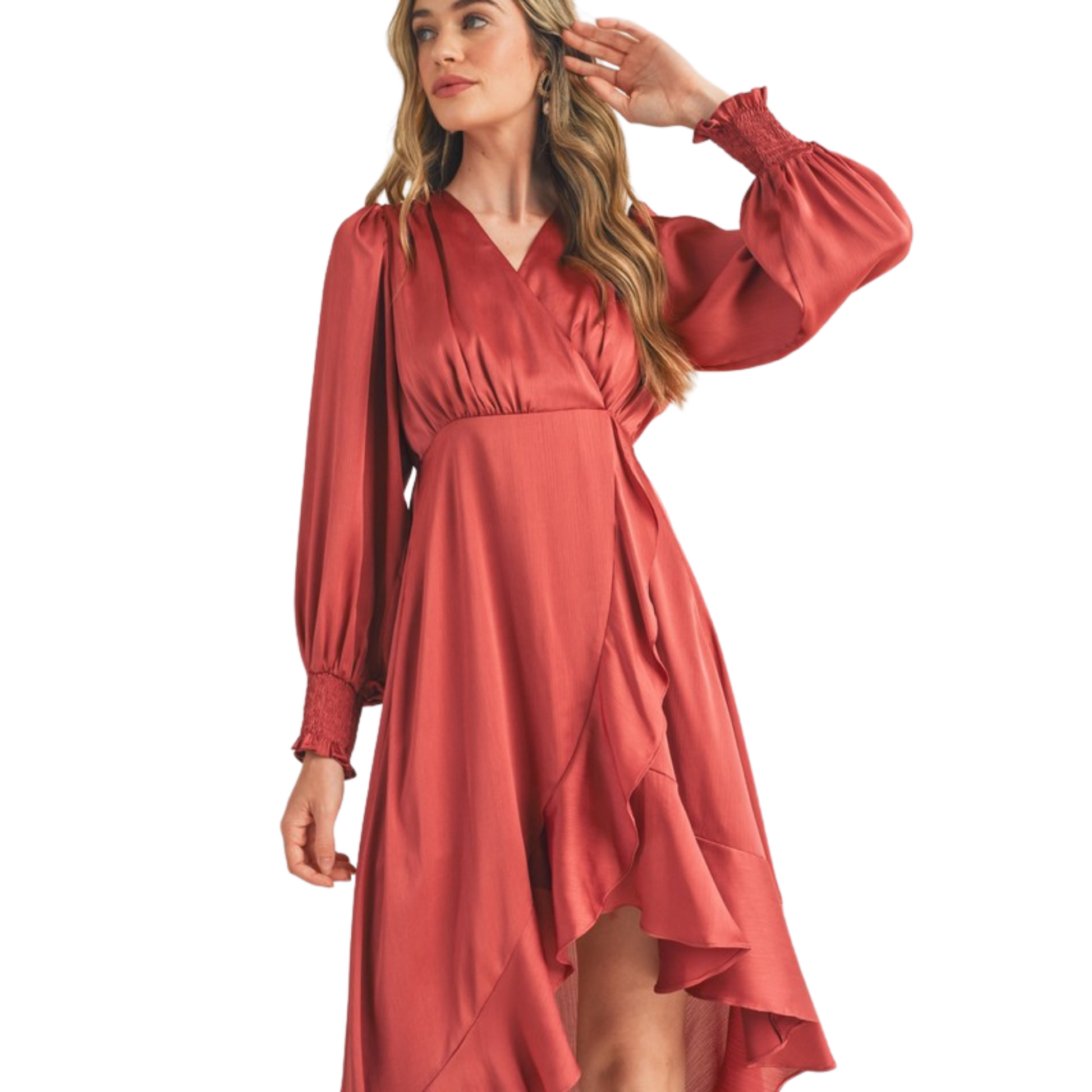 Look stunning in this ruffled hi-low midi dress crafted from a satin effect fabric with a flattering surplice neckline, long puff sleeves with smocked cuffs, and ruffle trim for a feminine finish. The high-low hem adds a timeless touch in the sophisticated rose vale color.