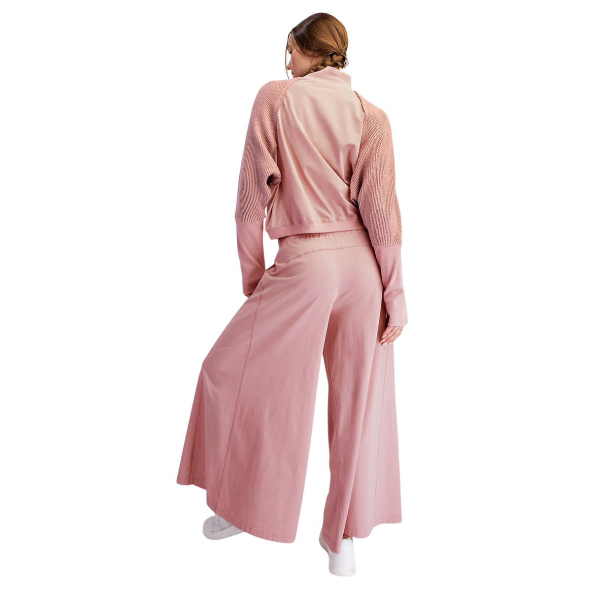 Elevate your everyday style with this sophisticated rose-colored two-piece set from Rae Mode. The long textured sleeves add visual interest and dimension to the top, creating a refined silhouette perfect for casual outings or relaxed weekends. Paired with matching bottoms, this coordinated ensemble offers effortless styling with a modern, polished look. The textured fabric detail brings depth and texture that photographs beautifully while remaining comfortable for all-day wear.