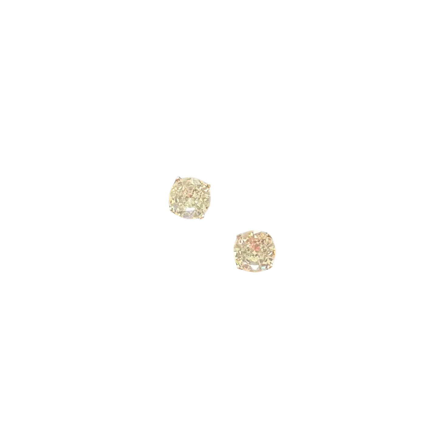 Expertly crafted with silver posts, these medium sized round rhinestone stud earrings add a touch of sparkle to any outfit. Perfect for both casual and formal occasions, these timeless earrings are a must-have for any jewelry collection. Enhance your look today with these stunning rhinestone studs.