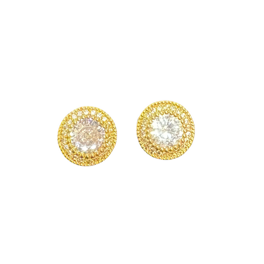 Crafted with elegance and sophistication, these Round Halo Stud Earrings by Amanda Blu are the perfect addition to any jewelry collection. Made with high-quality gold and accented with sparkling rhinestones, these stud earrings exude timeless beauty and are sure to elevate any outfit. Embrace luxury with every wear.