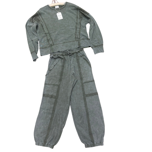 Embrace effortless comfort with this sage-colored sweatshirt and pants set by Very J. The vintage wash lends a relaxed, lived-in aesthetic perfect for lounging or casual outings. Soft fabric moves with you, while the coordinated design creates a polished two-piece look. An essential addition to any wardrobe seeking style without compromise.