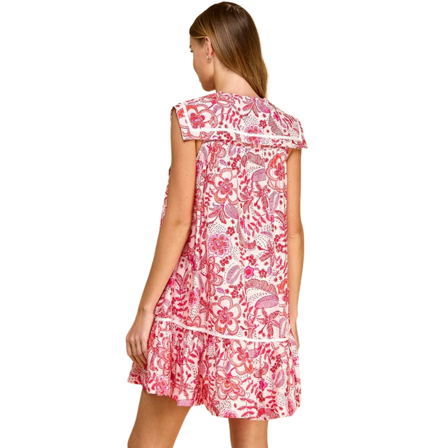 This TCEC Button Down Floral Mini Dress features a delicate floral print, perfect for a spring or summer day. The mini dress length adds a touch of flirty charm, while the sailor collar adds a touch of sophistication. Embrace the pink color and make a stylish statement with this TCEC brand dress.