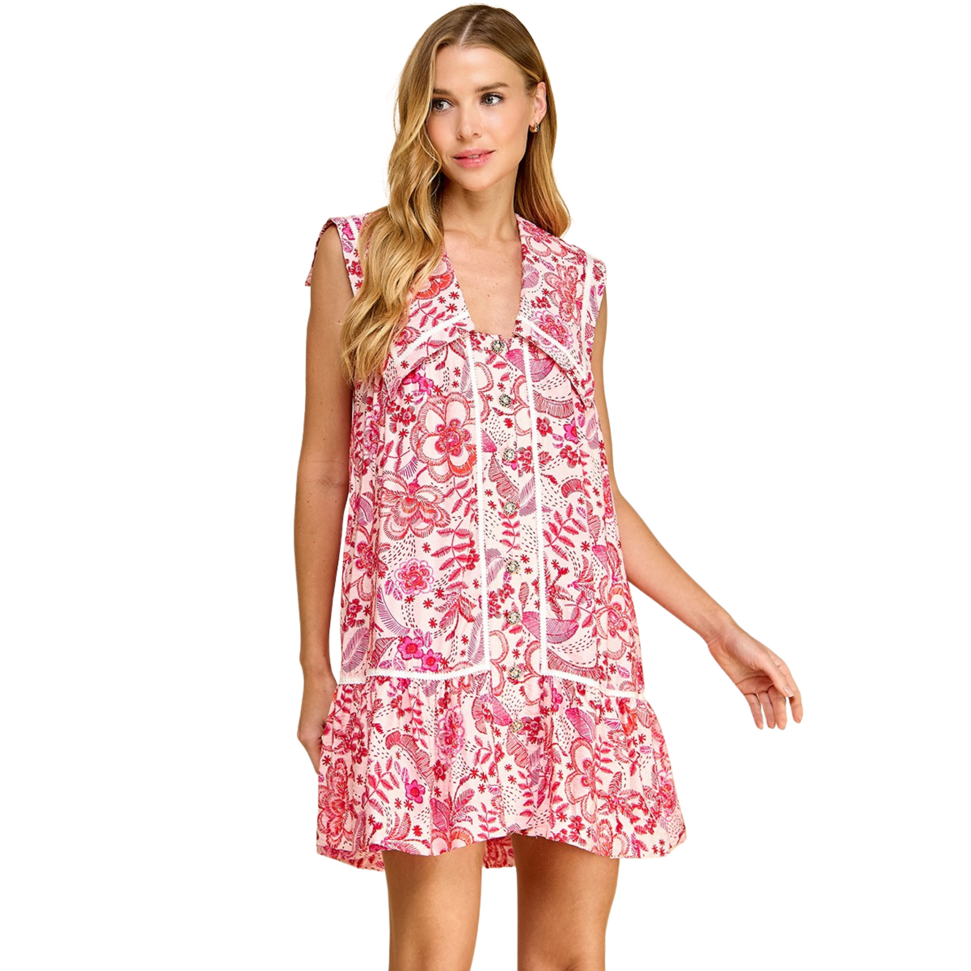 This TCEC Button Down Floral Mini Dress features a delicate floral print, perfect for a spring or summer day. The mini dress length adds a touch of flirty charm, while the sailor collar adds a touch of sophistication. Embrace the pink color and make a stylish statement with this TCEC brand dress.