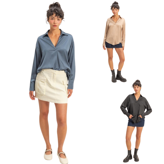 Elevate your wardrobe with the Satin V-Neck Top from Double Zero. Crafted from smooth satin, this long-sleeve piece offers a refined sheen and a flattering v-neckline, perfect for layering or wearing alone. Available in classic black, versatile dark taupe, and sophisticated dusty navy, it blends comfort with understated elegance for both day and evening wear.