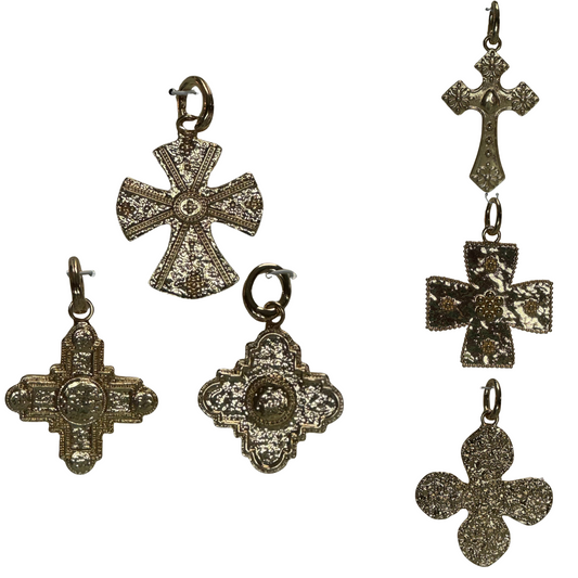 Elevate your accessory collection with the Golden Stella Scarf Necklace Charms. Crafted in a radiant gold finish, these charms offer a sophisticated touch to any scarf or necklace. Available in a variety of styles, they provide versatile options to personalize your look with expert finesse. Perfect for adding subtle elegance or making a statement, these charms combine quality craftsmanship with timeless design.