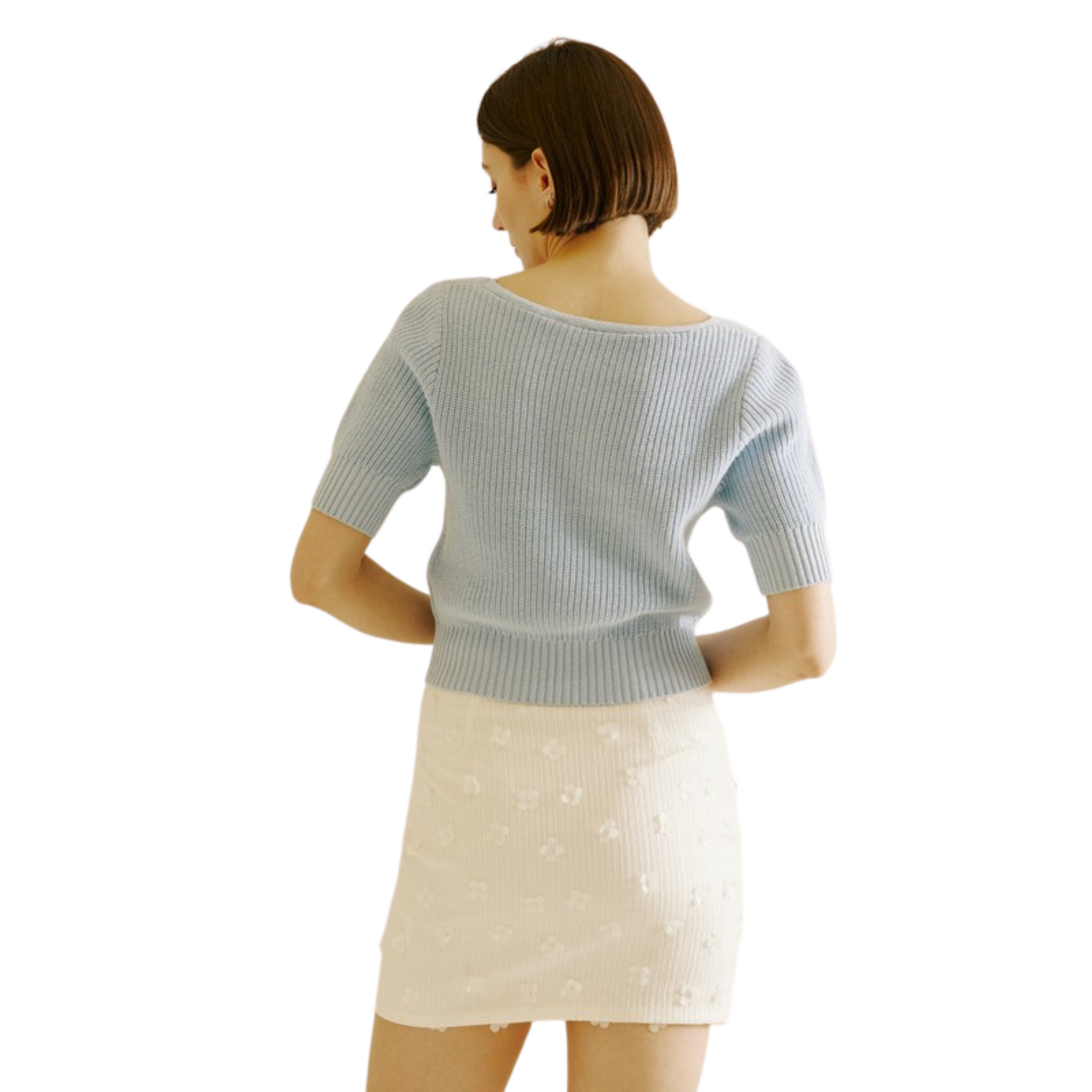 This ribbed knit cropped top is perfect for a classic look. With a square to scooped neckline, 3/4 fitted sleeves, and a semi-fitted body, this top is timeless and comfortable. Thick ribbed cuffs on the sleeves and hem add extra durability and style.