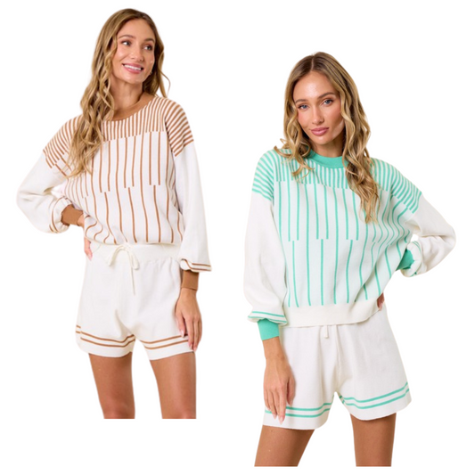 Let's set things straight... this is your new favorite set. The long sleeve top features a vertical striped pattern, a color-blocked round neckline, 2 horizontal wrist stripe details, and cuffed sleeves with a color block cuff. The matching white shorts feature an elastic waistband, tie front, and 2 horizontal band details.