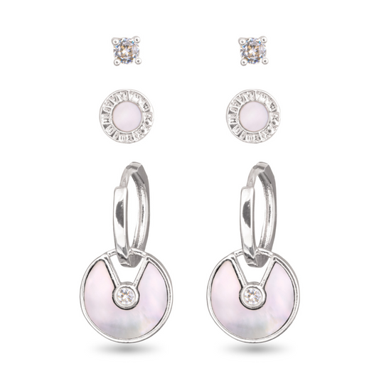 This set features three pairs of earrings: each adorned with radiant cubic zirconia and a delicate pearl, all set in shining silver. Elevate your style with this elegant trio.