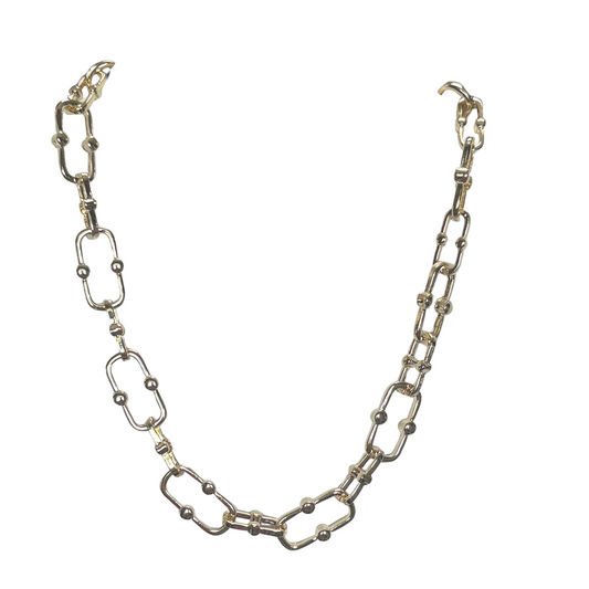 Elevate your accessory collection with this expert-crafted short necklace from Golden Stella. Featuring a refined gold chain link design, it offers timeless elegance and versatile style. Perfect for layering or wearing solo, this piece adds a sophisticated touch to any outfit while ensuring durability and a comfortable fit.