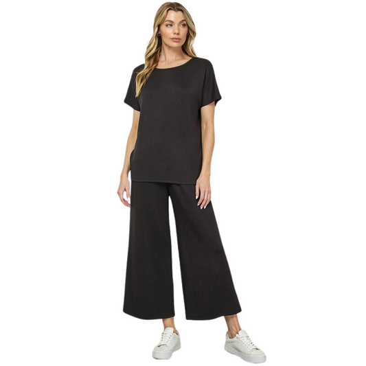 This plus size black Short Sleeve Lounge Top is perfect for lounging. Featuring a super soft fabric, this top is ideal for wearing all day. The short sleeve length makes it perfect for warmer climates.