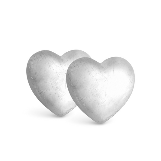 Crafted with a matte finish, Ella Matte Heart Studs are the perfect accessory to elevate any outfit. Made with high-quality silver, these stud earrings feature a charming heart shape. Add a touch of sophistication and style to your look with these elegant and timeless earrings.
