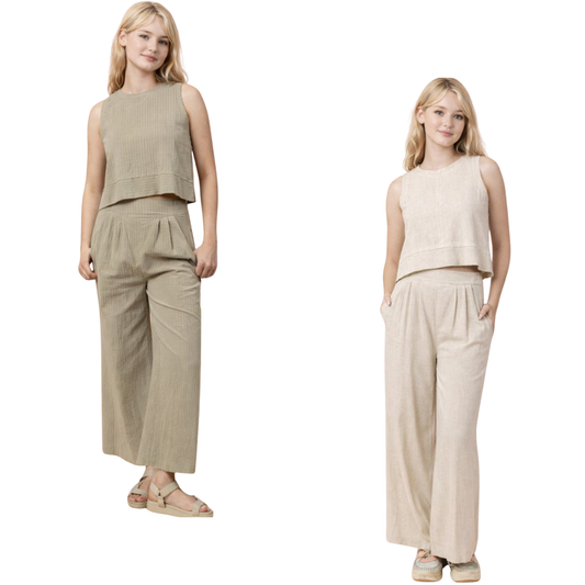 Effortless comfort meets timeless style with this Very J woven linen set. The sleeveless top pairs perfectly with matching wide-leg pants for a coordinated look that transitions seamlessly from day to night. Crafted from breathable linen, this two-piece set keeps you cool and comfortable in warm weather. Choose between classic oatmeal or sophisticated sage stripe to match your personal style. Perfect for casual outings, weekend getaways, or relaxed evenings at home.