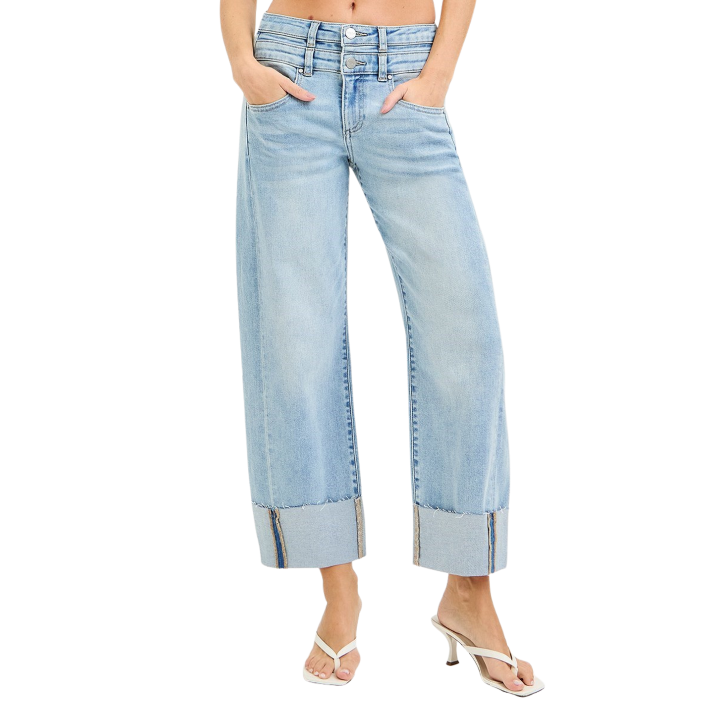 Slouchy Barrel Jeans in a light wash with a distinctive double waistband detail that adds modern edge to a relaxed silhouette. The cropped length hits at the ankle for a contemporary fit that pairs effortlessly with sneakers or heels. Crafted by Risen, these jeans deliver quality construction and on-trend styling for everyday wear.