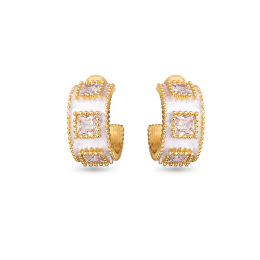 These Small Square Cut Huggie Earrings are a timeless addition to any jewelry collection. Made with quality gold material, they feature stunning rhinestone accents for an elegant touch. The classic hoops design offers versatility and style for any occasion. Upgrade your look with these beautiful earrings.
